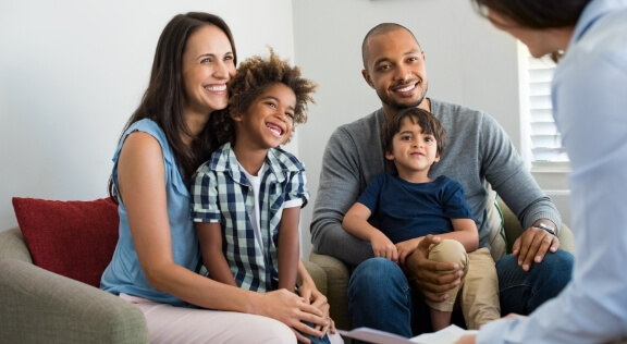 A family at a personal safety consultation.